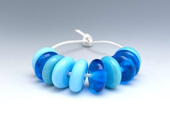 Ten Lampwork Spacer Beads in Various Shades of Aqua