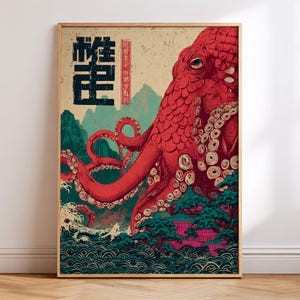 May include: A framed art print featuring a large red octopus with detailed tentacles, set against a backdrop of Japanese-style waves, mountains, and a building. The artwork includes Japanese text in black and red.