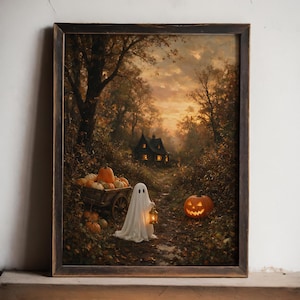 May include: A framed wall art print depicting a ghost holding a glowing lantern on a forest path at dusk. A wooden cart filled with orange pumpkins sits nearby, and a carved jack-o'-lantern rests on the ground. A dark house is visible in the distance.