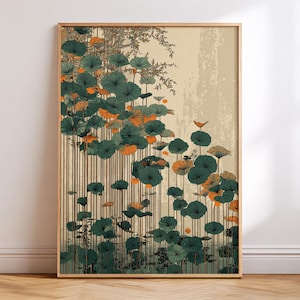 May include: A framed art print featuring a stylized illustration of water lilies. The artwork showcases green and orange lily pads with vertical brown lines against a beige background. The print is in a wooden frame, suitable for home decor.