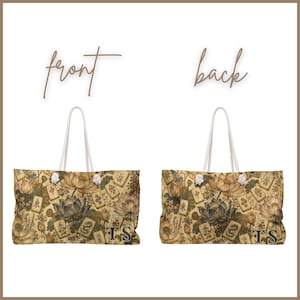 May include: A tote bag featuring a repeating pattern of lotus flowers and mahjong tiles in muted earth tones. The bag has white rope handles and the letters TS printed in the bottom right corner. The image displays both the front and back views.