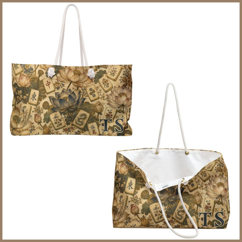 May include: A tote bag featuring a beige and brown pattern of lotus flowers and mahjong tiles, with the letters TS printed in the bottom corner. The bag has white rope handles and a white interior lining, shown from both the front and open angles.