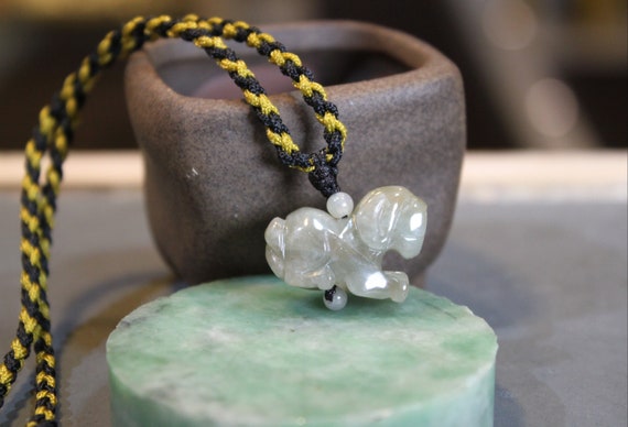 Jade dog pendant discount
