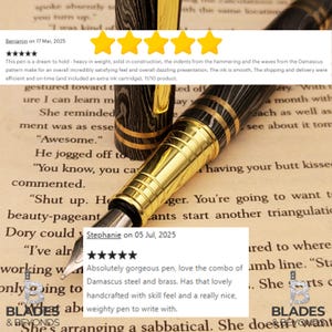 May include: A close-up of a luxury fountain pen with a gold-colored nib and accents. The pen features a Damascus steel barrel with a unique pattern. The pen is displayed on a background of printed text.