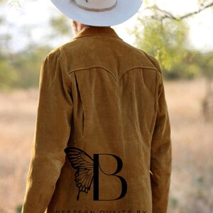 May include: A brown corduroy jacket with a Western-style collar and a butterfly logo on the back. The logo says "Western Outfits by Bilal".