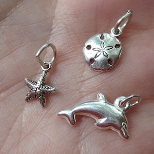 Sterling Silver Dolphin,Sand Dollar or Starfish Charms(one pair)You choose which one