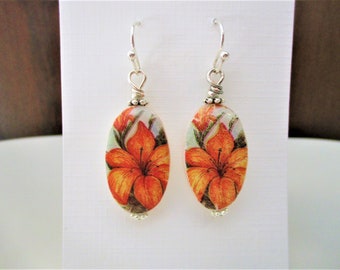 Orange Lily on  Oval Mother of Pearl Shell Base Earrings. Floral accessories. Handmade.