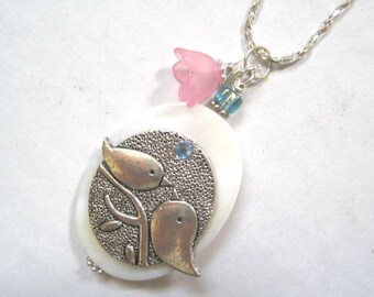 Two Birds on a Branch. Pendant on Mother of Pearl Shell.