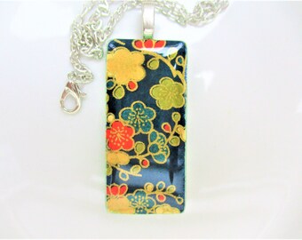 Cherry Blossoms against a night sky. Chiyogami paper. Glass Pendant Necklace. Handmade.