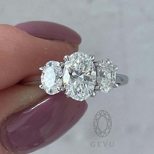IGI Solid Gold Oval Lab Grown Diamond Engagement Ring: Three Stone Cathedral Setting
