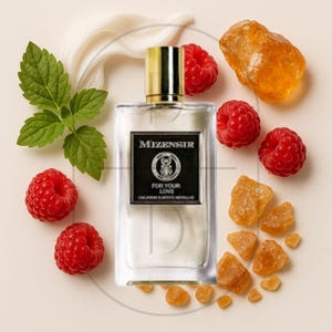 May include: A rectangular perfume bottle with a gold cap and a black label that reads "MIZENSIR FOR YOUR LOVE". The bottle is surrounded by fresh raspberries, mint leaves, and amber-colored crystals, creating a luxurious aesthetic.