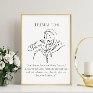 Puede incluir: Una impresión enmarcada con el texto "JEREMIAH 29:11" y un dibujo lineal de una figura. La cita a continuación dice: "Porque yo sé los planes que tengo para vosotros", declara el Señor, "planes para prosperaros y no para perjudicaros, planes para daros esperanza y un futuro."