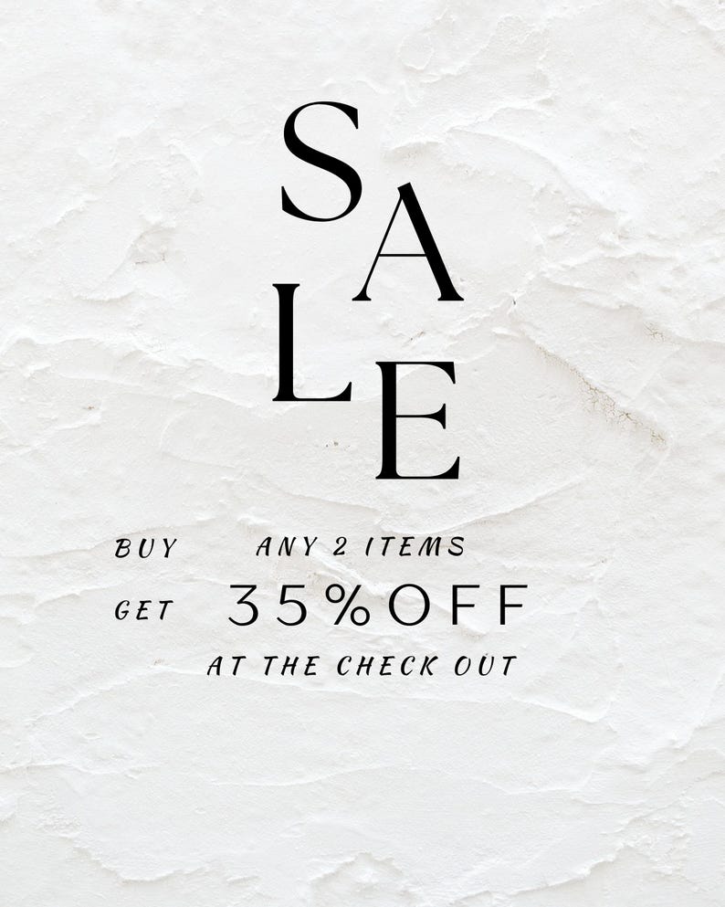 May include: White textured background with the word "SALE" in large black letters. Below, the text reads "BUY ANY 2 ITEMS GET 35% OFF AT THE CHECK OUT."