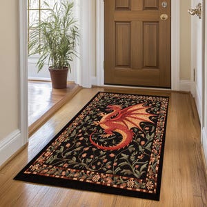 May include: A black and red dragon rug with a floral design. The rug has a black background with a red dragon in the center. The dragon is surrounded by a floral design in shades of green and red.