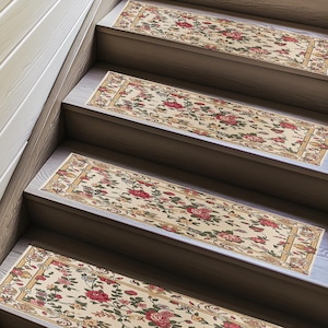May include: Stair treads with a floral pattern. The treads feature a cream background with red and pink roses, green leaves, and a gold border. The treads are placed on wooden stairs.