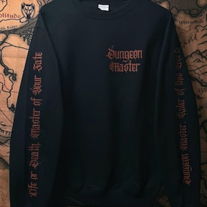 Dungeon Master Crewneck [ Dungeons and Dragons D&D Black Red Fleece Sweatshirt D20 Sword Magic Sweater Gothic Emo Alternative Jacket ]
