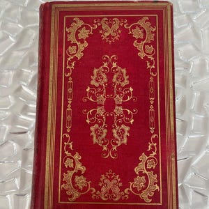 Libro antico del 1849, "Il pellegrinaggio del pellegrino nel diciannovesimo secolo" di William R. Weeks, rilegatura vittoriana decorata in rosso e oro, raro oggetto da collezione