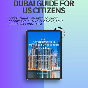 May include: A digital tablet displays a guide titled "A Practical Guide to Moving and Living in Dubai as a US Citizen." The cover features a cityscape at night. The title "DUBAI GUIDE FOR US CITIZENS" is at the top, with additional text below.
