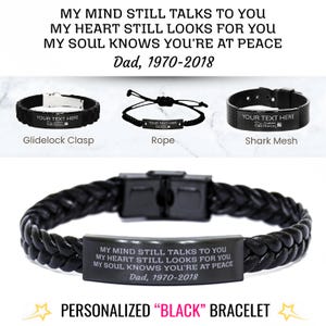 May include: Black personalized bracelet with braided leather and a metal plate engraved with text. The image also shows three other bracelet styles: Glidelock Clasp, Rope, and Shark Mesh. The text on the bracelet reads: "MY MIND STILL TALKS TO YOU...Dad, 1970-2018."