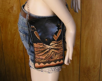 Tapestry and leather cross body bag, safari print tapestry with black leather & 46" copper chain strap, loop for belt, bag is 8" x 5" x 1"