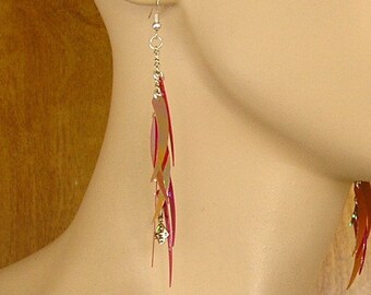 Shimmer earrings, fuchsia iridescent tusk sequins dangle from a silver tone chain on French hooks, they change color as they dance