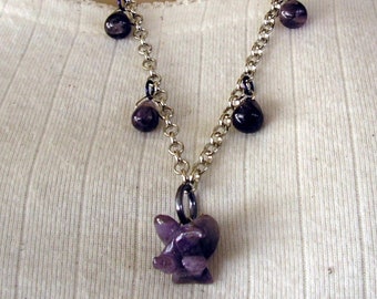 Amethyst Eagle Necklace with an amethyst carved pendant and 10 amethyst briolette beads on a 24" silver rolo chain, handmade in USA