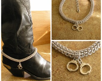 Chainmail Boot Bracelet with handcuffs, 12" long, 1/4" aluminum jump rings, a metal charm with a lobster clasp and 2" extender chain.