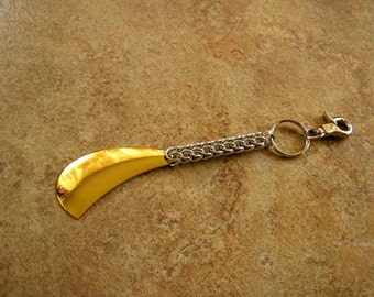 6.5" - Chainmail Keychain,  with a brass tone metal charm on a 1" key ring with a trigger clip