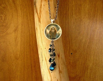 Moon Goddess 1" glass cabochon pendant with blue iris Czech crystal beads, set in a silver bezel with a 24" rolo chain