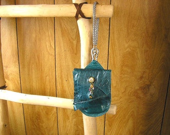 Lotus - Teal Leather Clip on Hip Bag with wristlet strap,  5 3/4" x 4 1/2" x 3/4" with a lotus charm, crystals, ball button and spring clip