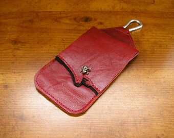 Smart Phone, Red and Black Leather clip on cell phone bag with skull button  5 3/4" x 3 1/4" with a belt loop in the back and a spring clip