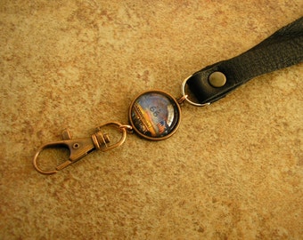 ID Lanyard, Route 66, black leather and charm lanyard, strap is 34" long with a charm and a spring clip.