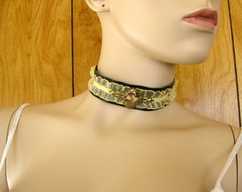 Victorian garter choker, yellow ribbon and black leather choker, glass and brass charm with brass brads, 1 1/4" wide, with leather ties