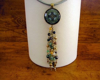 Celtic Cross Choker with 30mm glass cabochon charm set in a brass frame, with gemstone chain on a 17" green cord with adjuster chain