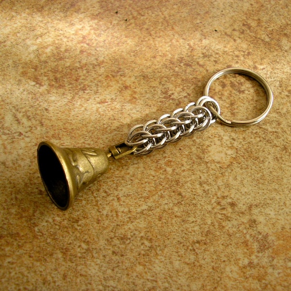 Brass bell Chainmail Keychain, a brass bell with rabbit and bird design on a 1" key ring 3 1/2" long overall