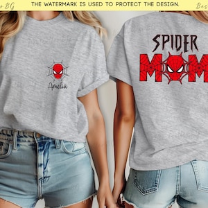 Puede incluir: Camiseta gris jaspeada con dise&ntilde;o de Spider-Man. La parte delantera tiene un peque&ntilde;o logo de Spider-Man y el nombre "Amelia". La parte trasera muestra "SPIDER MOM" con un gr&aacute;fico de Spider-Man. Prenda de vestir informal.