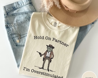 Hold On Partner I'm Overstimulated Comfort Colors T-shirt, Cowboy Frog Shirt, Funny Frog Western Cowboy Gift ,Funny Frog Shirt -FUN001