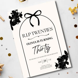 May include: A cream-colored invitation with black text and floral accents. The text reads "R.I.P. TWENTIES" and "Olivia is turning Thirty." The invitation includes the date, time, and location for the event.