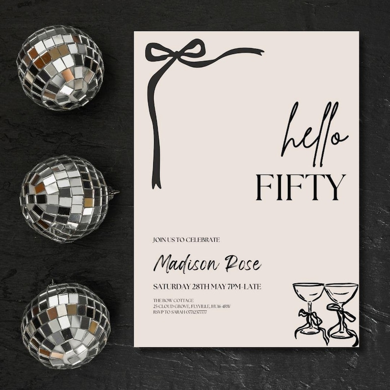 May include: A party invitation with the text "hello FIFTY" in black script. The invitation includes details for Madison Rose's celebration. Three disco balls are arranged around the invitation on a dark surface.