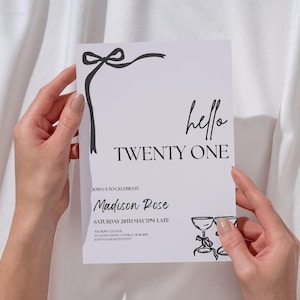 May include: A white invitation card with black text and a decorative bow. The words "hello TWENTY ONE" are displayed prominently. Additional text includes a name, date, and time. Two champagne glasses are illustrated at the bottom.