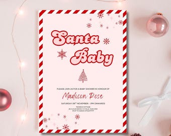 Peut inclure: Une invitation à une baby shower avec un fond rose et une bordure rayée rouge et blanche. Le texte "Santa Baby" est dans une police rétro. L'invitation comprend les détails de la baby shower de Madison Rose.