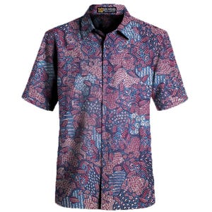 May include: Short-sleeved button-down shirt with a vibrant, intricate pattern in shades of blue, red, and purple. The shirt features a classic collar and a full button closure. The fabric is densely patterned with floral and abstract shapes.