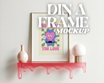 Op de afbeelding: Een roze plank met een druppelend effect, met een ingelijst afdruk met een cartoon hartfiguur en de tekst "Do what you love". Rechts van het frame staat een witte globe lamp op de plank.