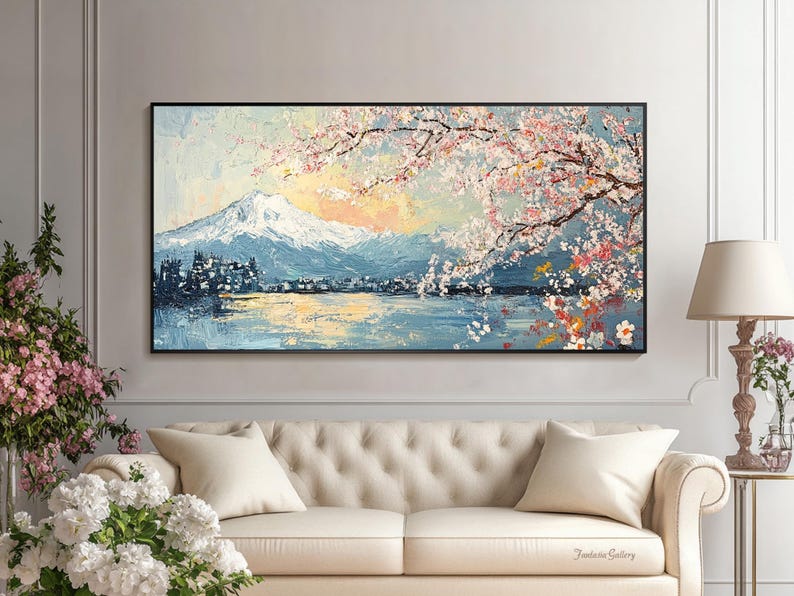 May include: A painting of a mountain range with a lake in the foreground. The mountain range is covered in snow and the lake is surrounded by trees. The sky is blue and there are pink and white flowers in the foreground.