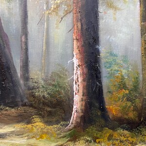 May include: A painting of a misty forest scene with tall trees and a path leading into the woods. The trees are mostly brown and green, with some hints of yellow and orange in the leaves. The path is light brown and leads into the distance.