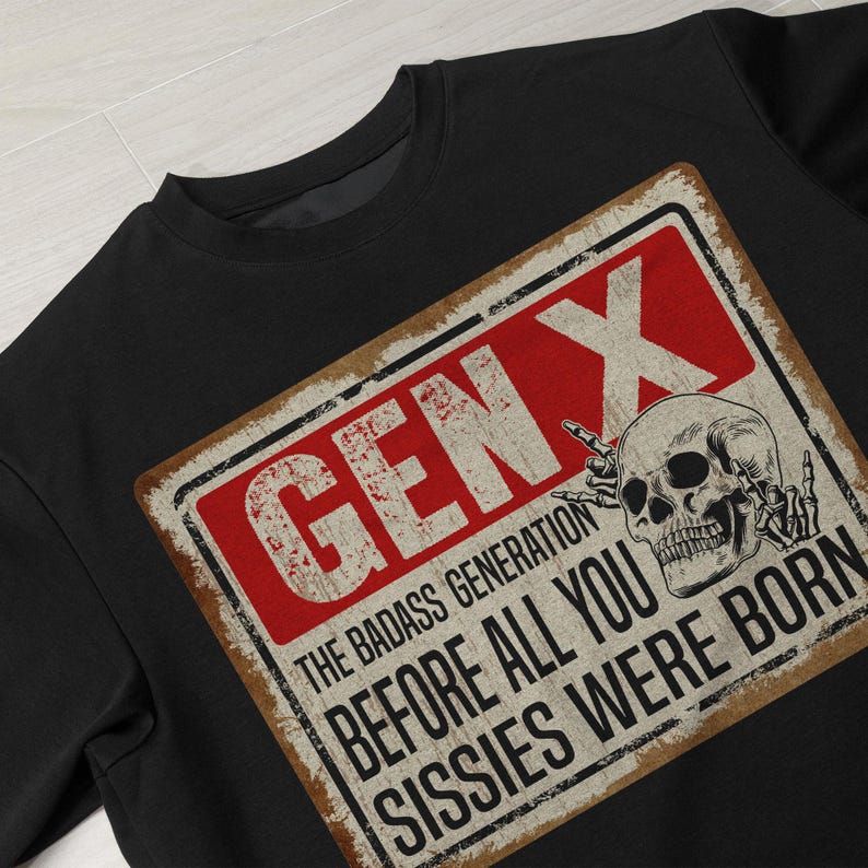 May include: Black sweatshirt with a vintage-style sign that reads "Gen X The Badass Generation Before All You Sissies Were Born" with a skull graphic.