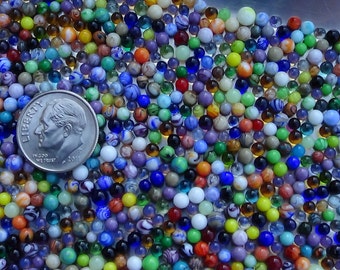 500 Miniature Glass Marbles by Rebecca Hooper