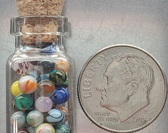 About 40 Miniature Glass Marbles by J. R. and Rebecca Hooper