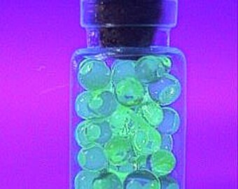 30-40 Miniature Vaseline Glass Marbles by J. R. Hooper