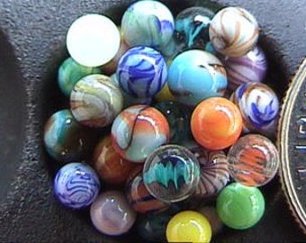 100 Miniature Glass Marbles by Rebecca Hooper